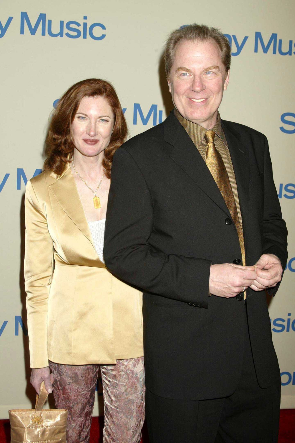 Майкл МакКин с женой Аннетт О’Тул (2004)